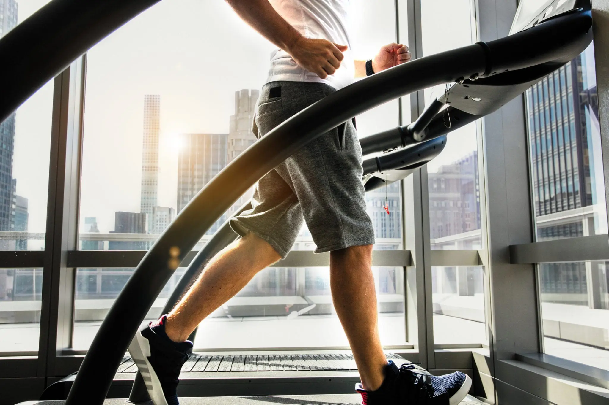 man running on treadmill