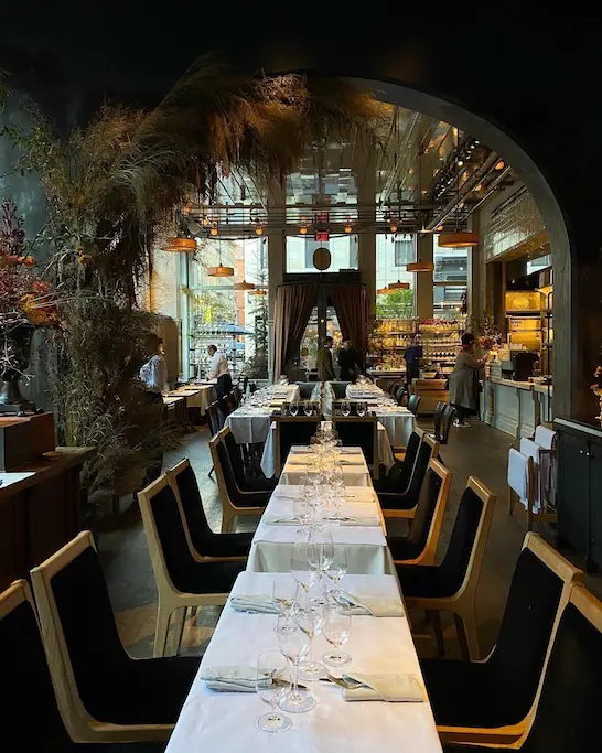 interior of restaurant with dinning tables ready for service