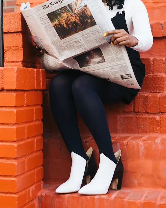 woman wearing white shoes