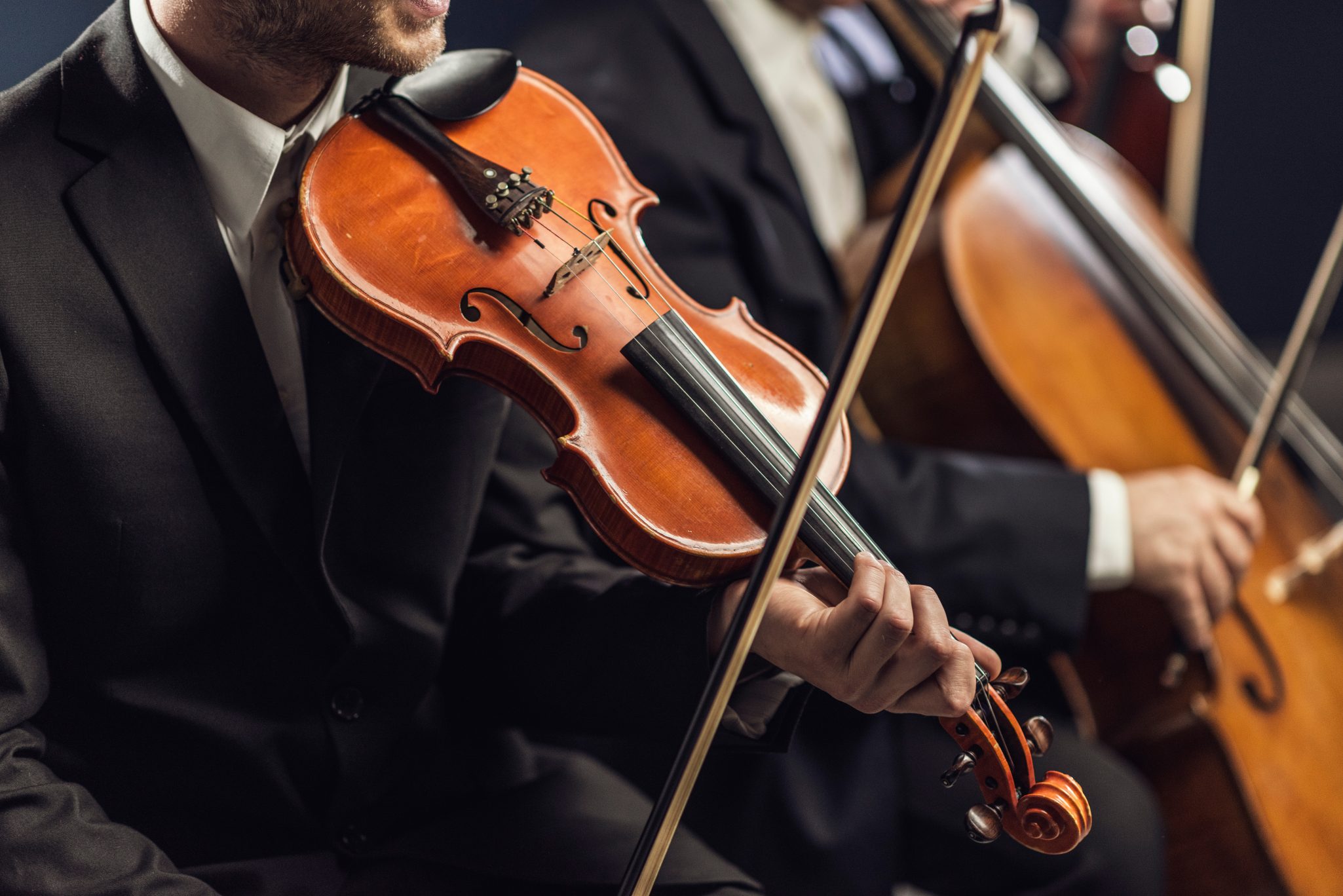 man playing violin