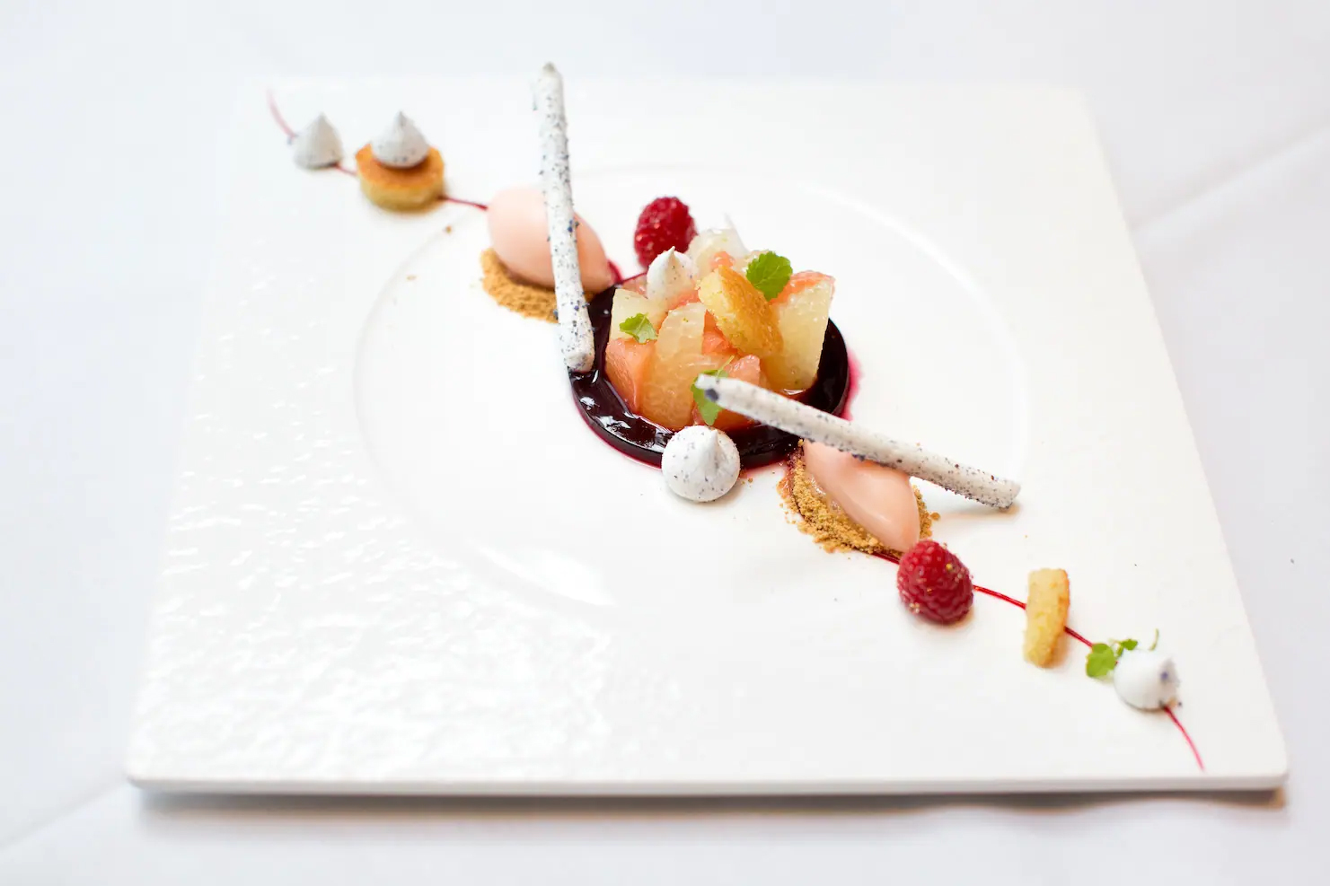 Food with white plating from A Taste of Aureole at The Knick
