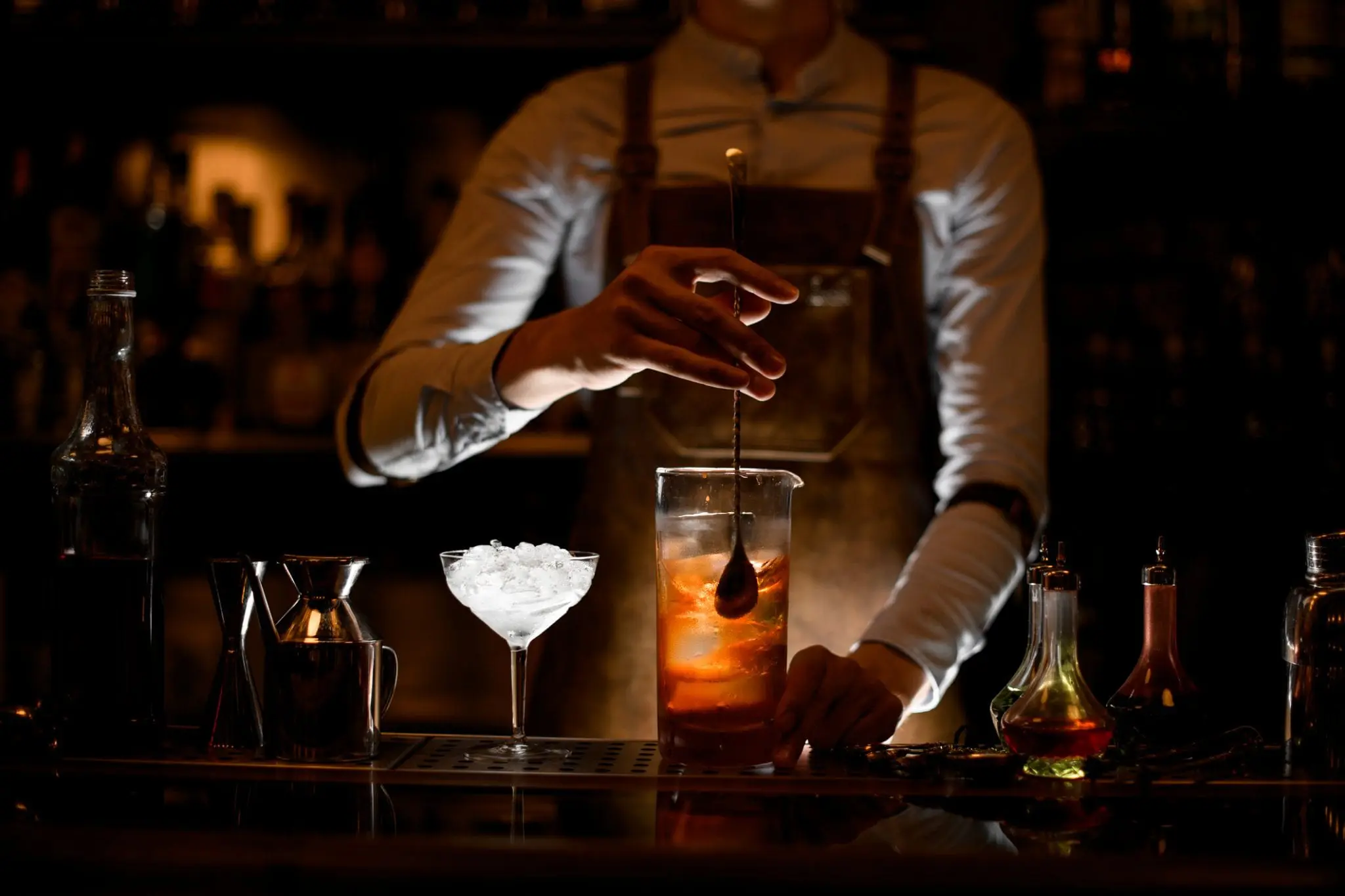 barista making a cocktail